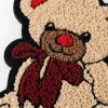 Beige teddy bear embroidered patchwork with red bow and red nose tip decoration DIY handmade fabric accessories Application Scenario